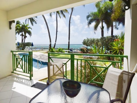 Private patio on the ground floor right by the pool