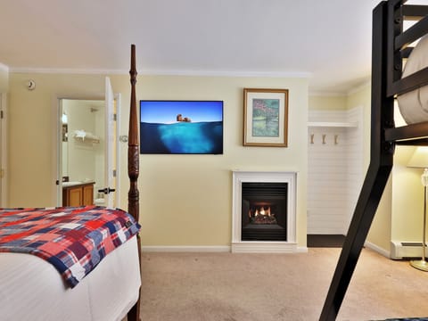 Your Family Room with 55" smart TV, gas fireplace and ensuite bathroom.