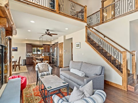 Living Room - Vaulted ceilings and high-end finishes give the living space a luxurious feel.