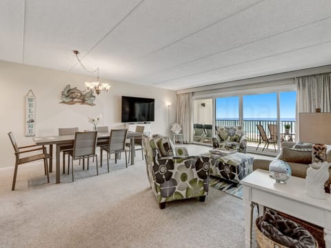 Oceanview from Living Room with TV and Dining Area