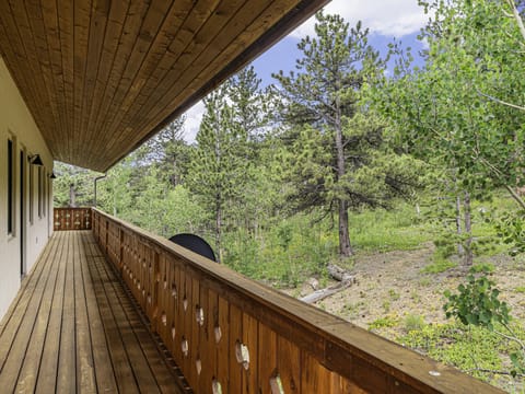 H7 at Hope Mountain Estes Park, Deck wraps around the home and features some beautiful mountain views.