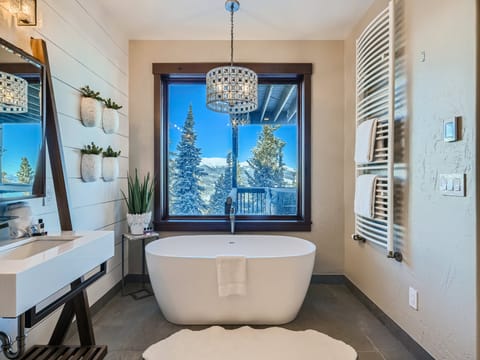 The primary suite soaking tub boasts incredible views of the Breckenridge Ski Area!