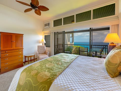 Comfortable King bed in the primary bedroom with private lanai