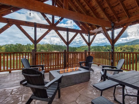 Gas firepit with seating and view.