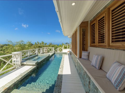 Indulge in the unique pool and jacuzzi while taking in the ocean views