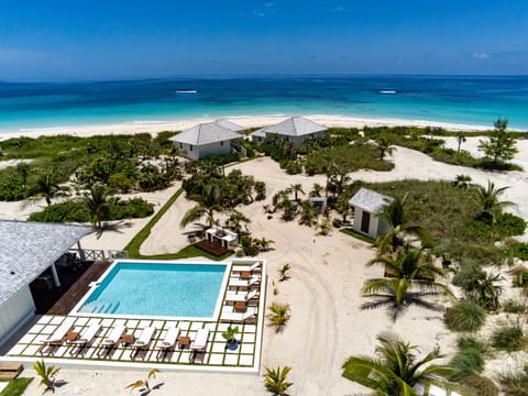 Welcome to the Bohemia Estate, a private 3-acre estate located directly on a mile-long pink-sand beach near Governors Harbour.