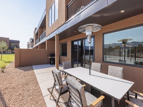 The Back Patio includes an outdoor dining table, BBQ grill, and sliding glass door that leads into the living room.