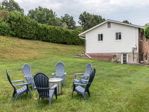 Spacious backyard with firepit for gatherings of family and friends