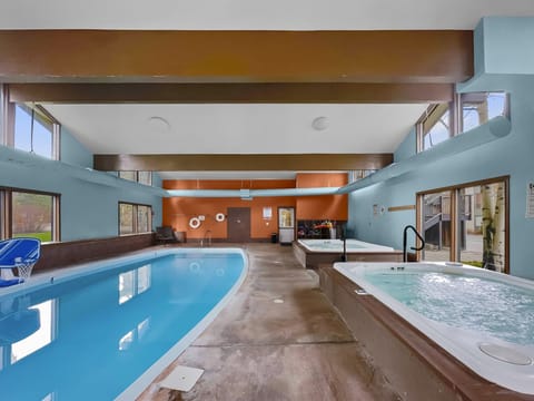 Large indoor pool and hot tubs at the communal clubhouse.