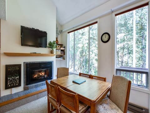 Dining area and cozy gas fireplace