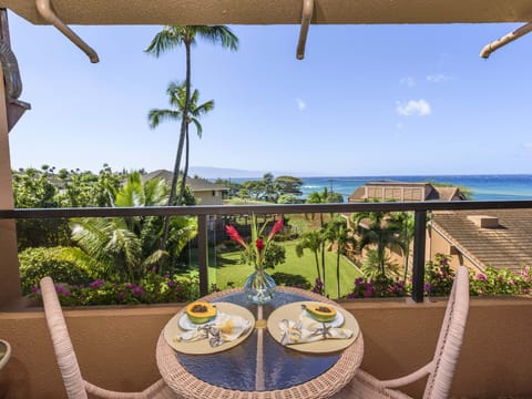 lanai seating area with ocean and mountain views