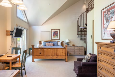 Welcome! This home features a bed in the common area as well as an additional lofted space.