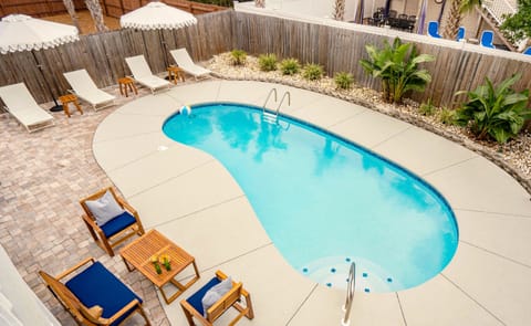 Pool with plenty of lounging options.