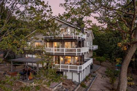 A huge home with multiple decks.