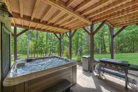 Your waterfront retreat with a just-installed hot tub for ultimate relaxation.