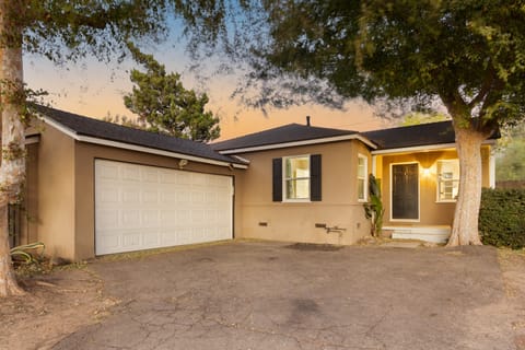 Enjoy space for 4 cars in the garage and driveway.