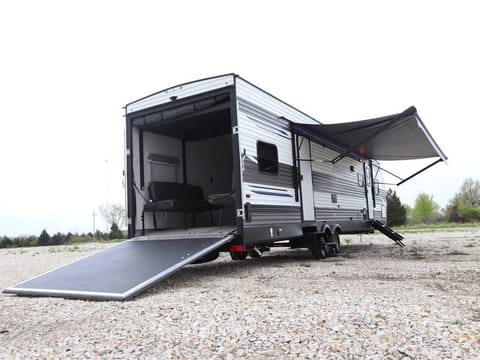 Separate Sleeping Areas PLUS Golf Cart Towable trailer in Seminole