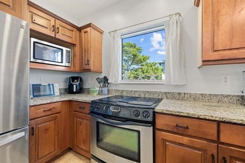 Fully equipped with stainless appliances and natural light.