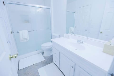 second bathroom that is shared has a full shower and vanity with soaps &
towels