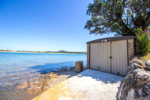 Boat shed for storing the kayaks and paddle boards.
