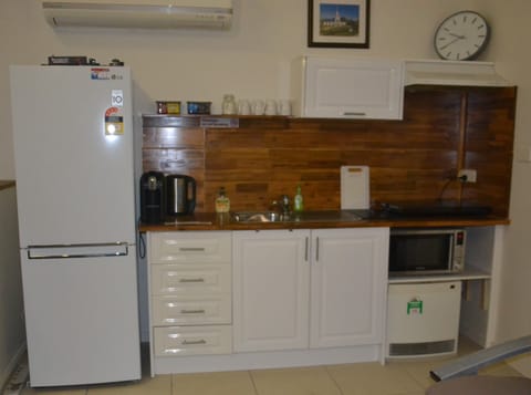 Fridge, microwave, coffee/tea maker, electric kettle