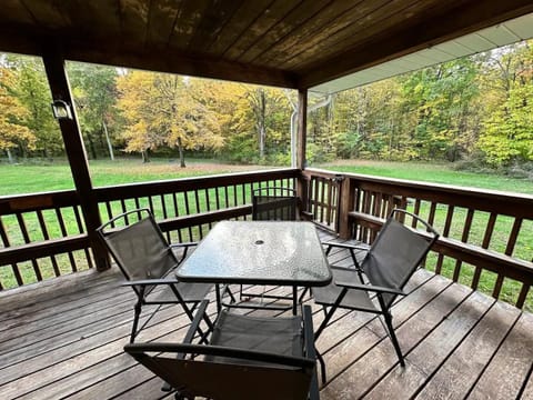 Back covered deck that leads to the large back yard.