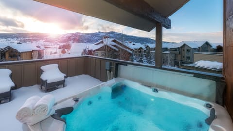 Soak up private winter sunset views of Emerald Mountain