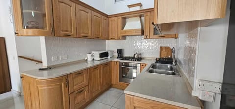 Fridge, oven, electric kettle, highchair