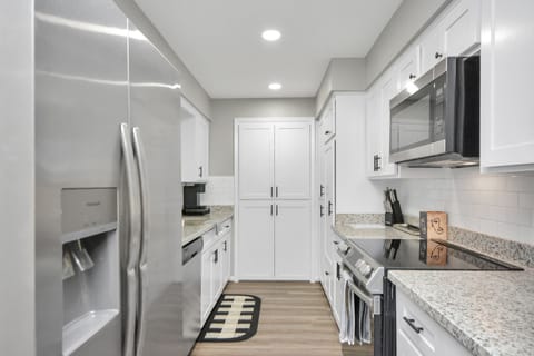 The kitchen comes complete with dishes, utensils, pots/ pans, & a Keurig :)