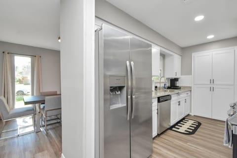 The kitchen & living room flow together seamlessly, making entertaining a breeze