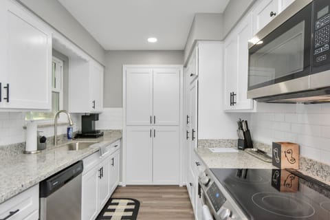 Enjoy the spacious updated kitchen, perfect for creating delicious memories. 