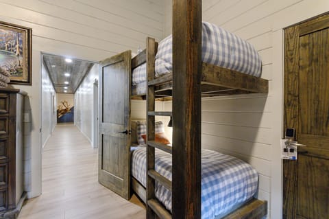 Bunkroom that boasts of 6 queen beds and 2 twin.