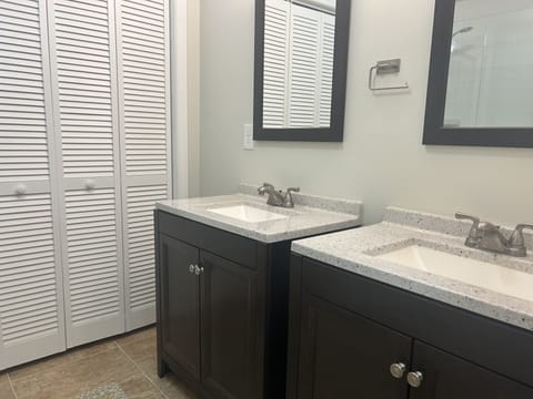 Combined shower/tub, hair dryer, towels, soap