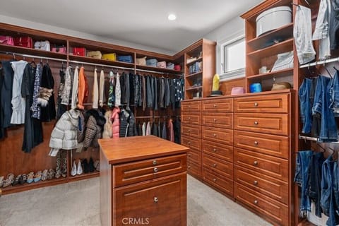 Spacious walk in closet for his and her and beyond!