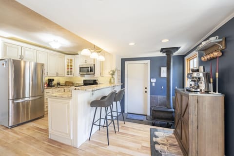 Fridge, stovetop, coffee/tea maker, highchair