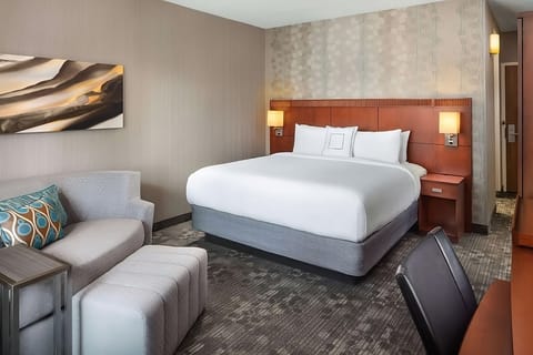 Unit with King bed. Exact unit will be assigned upon arrival. Views, colors, and decor may vary.