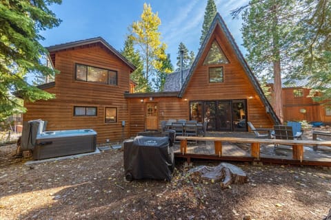 Great backyard area with private hot tub, grill, large deck, outdoor dining & seating area