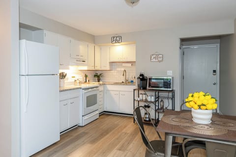 Full Kitchen - Microwave, dishes, utensils & blender. Keurig with coffee, tea creamer and sugar.