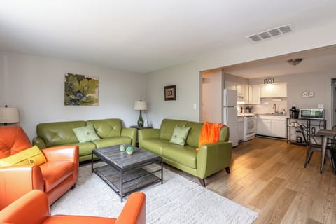 Living Room with 2 couches, 2 chairs, 55 inch TV Roku Smart TV, Hi speed Wi-fi, great for business travelers