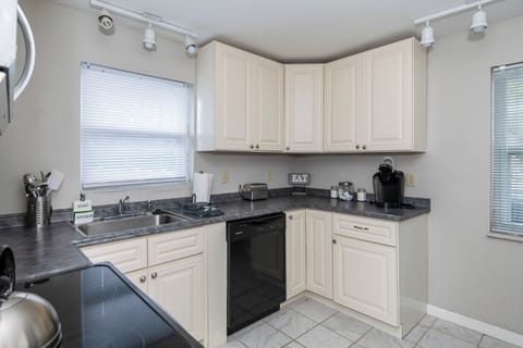 Whether you're reheating takeout or channeling your inner Gordon Ramsay, this bright and cheerful kitchen has your back. Fully stocked with essentials, a Keurig for that first morning brew, and plenty of counter space for pancake flipping or pizza slicing.