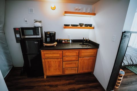 Fridge, microwave, stovetop, coffee/tea maker