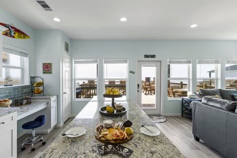 Large kitchen island with beautiful views of the Gulf.