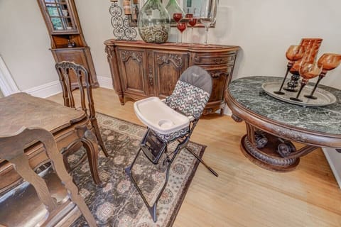 Family-Friendly Features: High Chair, Beautiful Furnishings, and Impressive Woodwork
