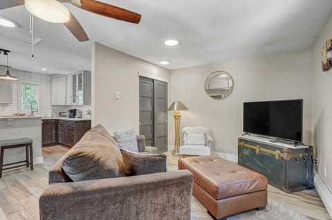 Kick back and relax in the inviting living area, complete with a Smart TV for your entertainment.