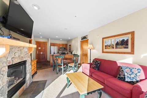 Living area with gas fireplace and flat screen TV
