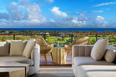 Relax on our lanai, embraced by ocean views that stretch to the horizon, blending comfort with the beauty of the sea.