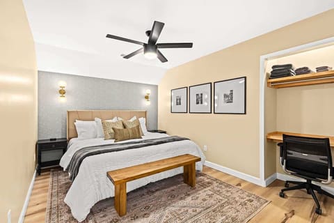 This bedroom is the perfect place to relax and unwind after a long day, or to get some work done in a quiet and comfortable setting.