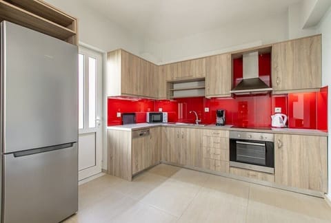 A fully equipped kitchen space where culinary creativity meets convenience.