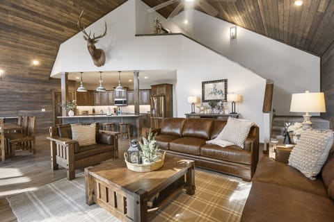 Vaulted living, kitchen, and dining spaces