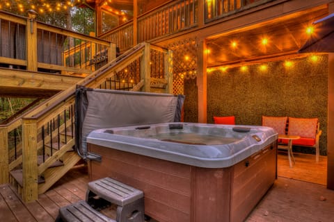 Take an evening soak in the 7 person lounge seating hot tub
